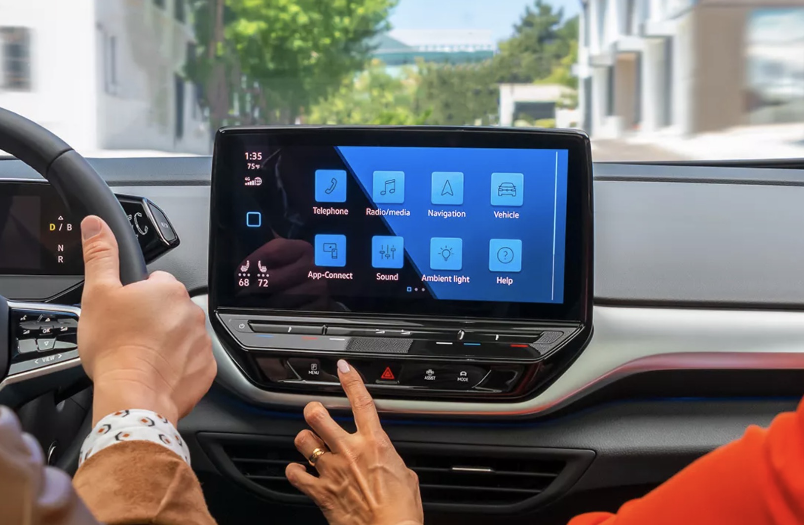 Volkswagen navigation system being used by the man and woman inside the vehicle.