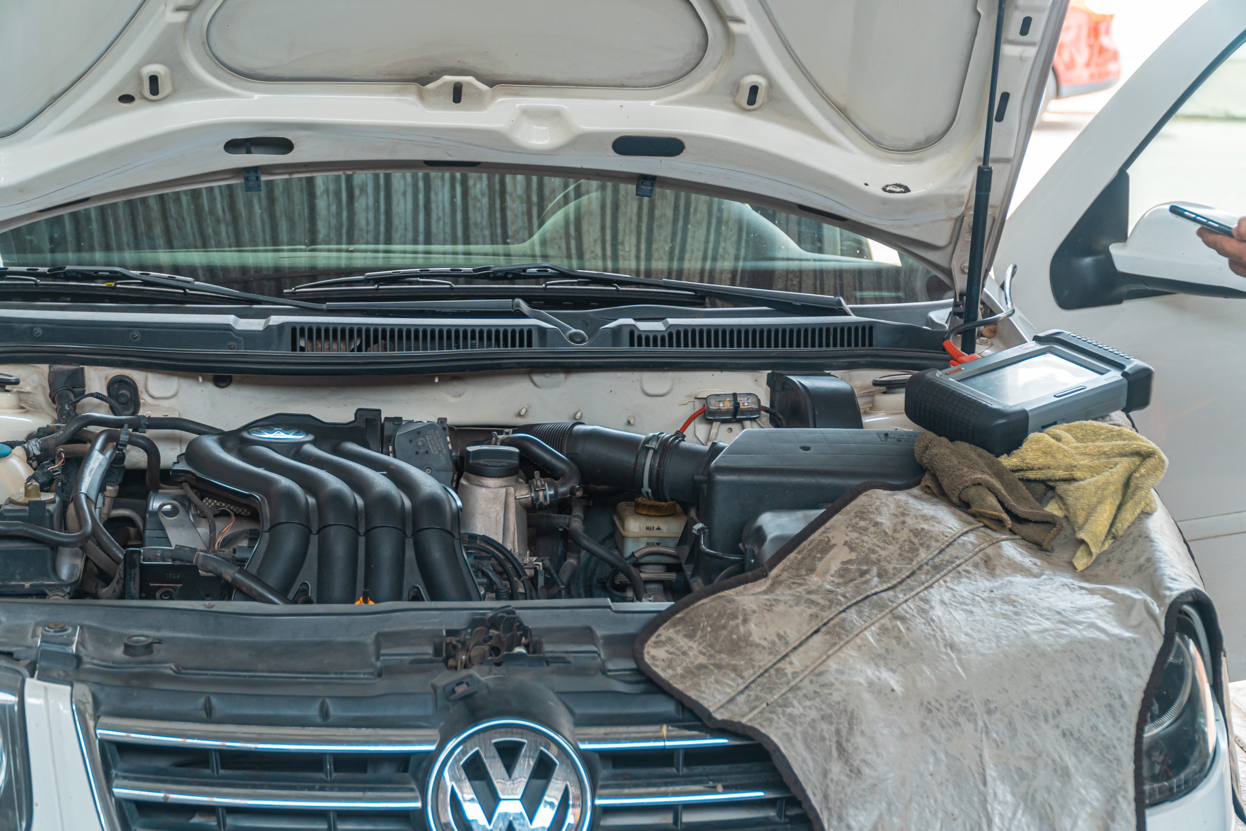 Volkswagen's hood open for servicing