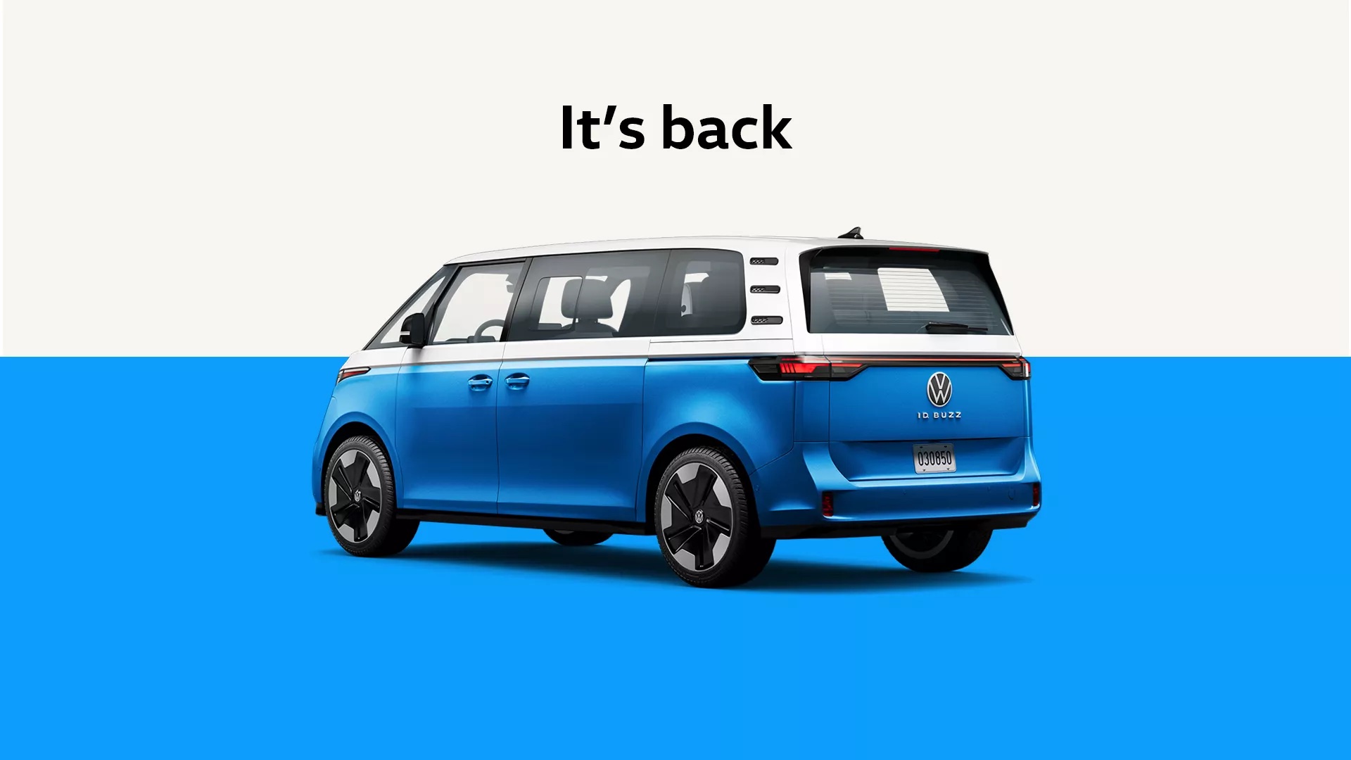 "It's Back" is the text on the 2024 Volkswagen ID. Buzz image with a rear view of the two-toned microbus.