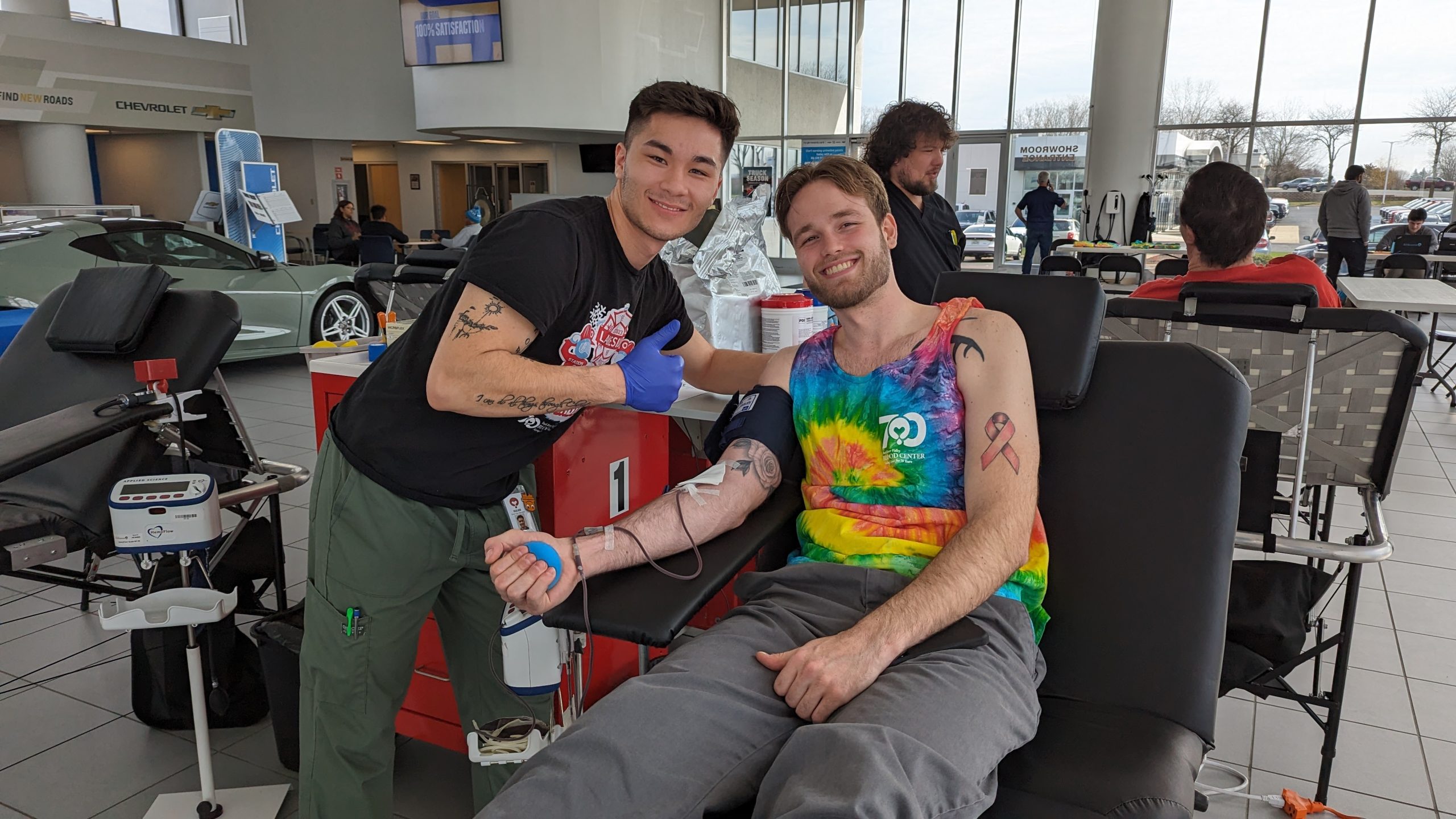 person donating blood at the lou bachrodt vw's blood drive