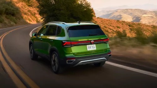 A Green Moss 2026 VW Taos in Rockford, IL