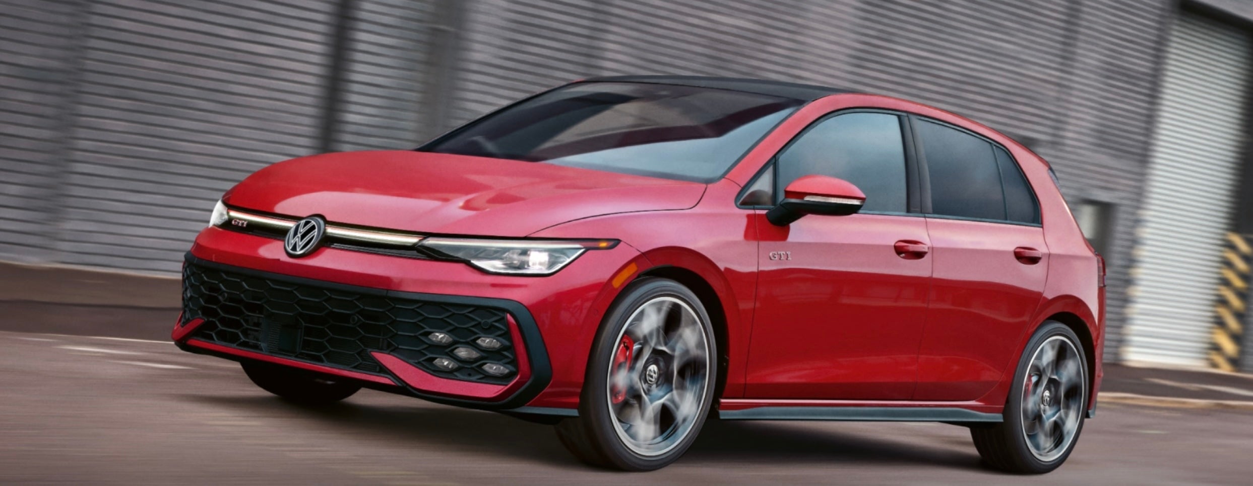 2025 VW Golf Exterior in red from a front view.